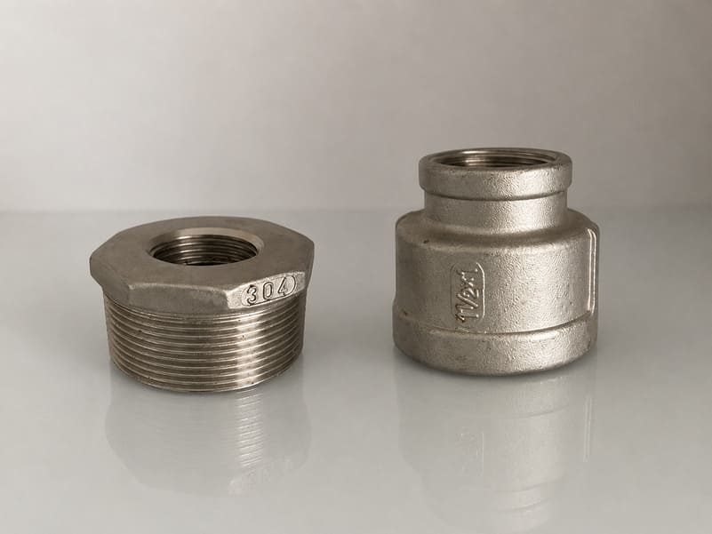 pipe bushing and reducing coupling